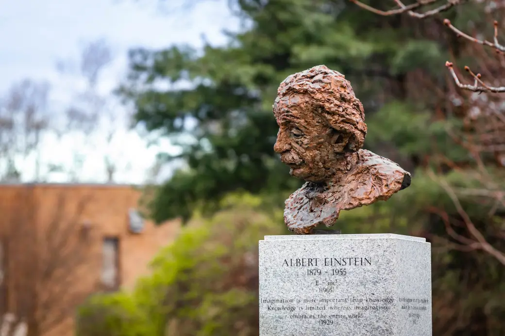 A bust of Albert Einstein on a pedestal at Princeton University.