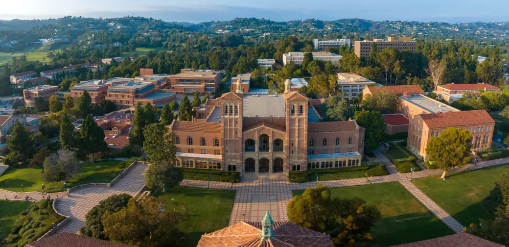 Aerial view of UCLA campus buildings surrounded by greenery – Opus College Prep.